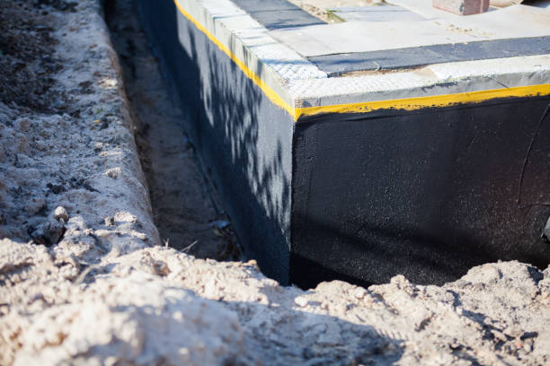 Professional Emergency Waterproofing technician working in Springville, IN